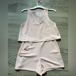 Blush colored romper with pockets